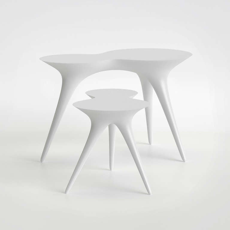 Ice Tables by Timothy Schreiber are pure white in color and buffed to a wonderfully smooth finish. 

Ice Tables are from an edition of 12. 

Timothy Schreiber initially trained in cabinet making in Germany before studying architecture and design at