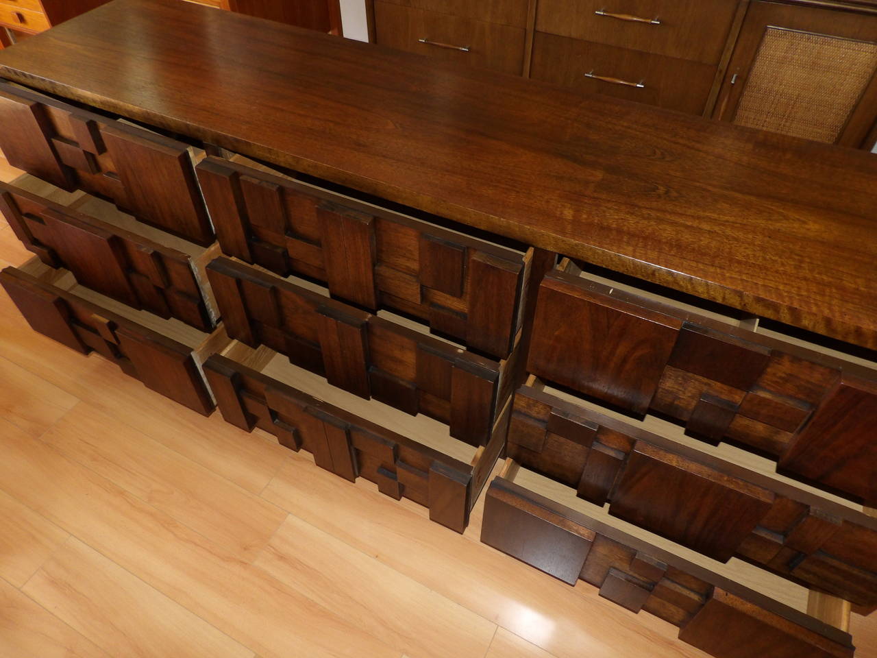 A cubist nine-drawer walnut tile dresser by Lane Furniture. Beautiful figured wood grain with solid oak secondary woods. 