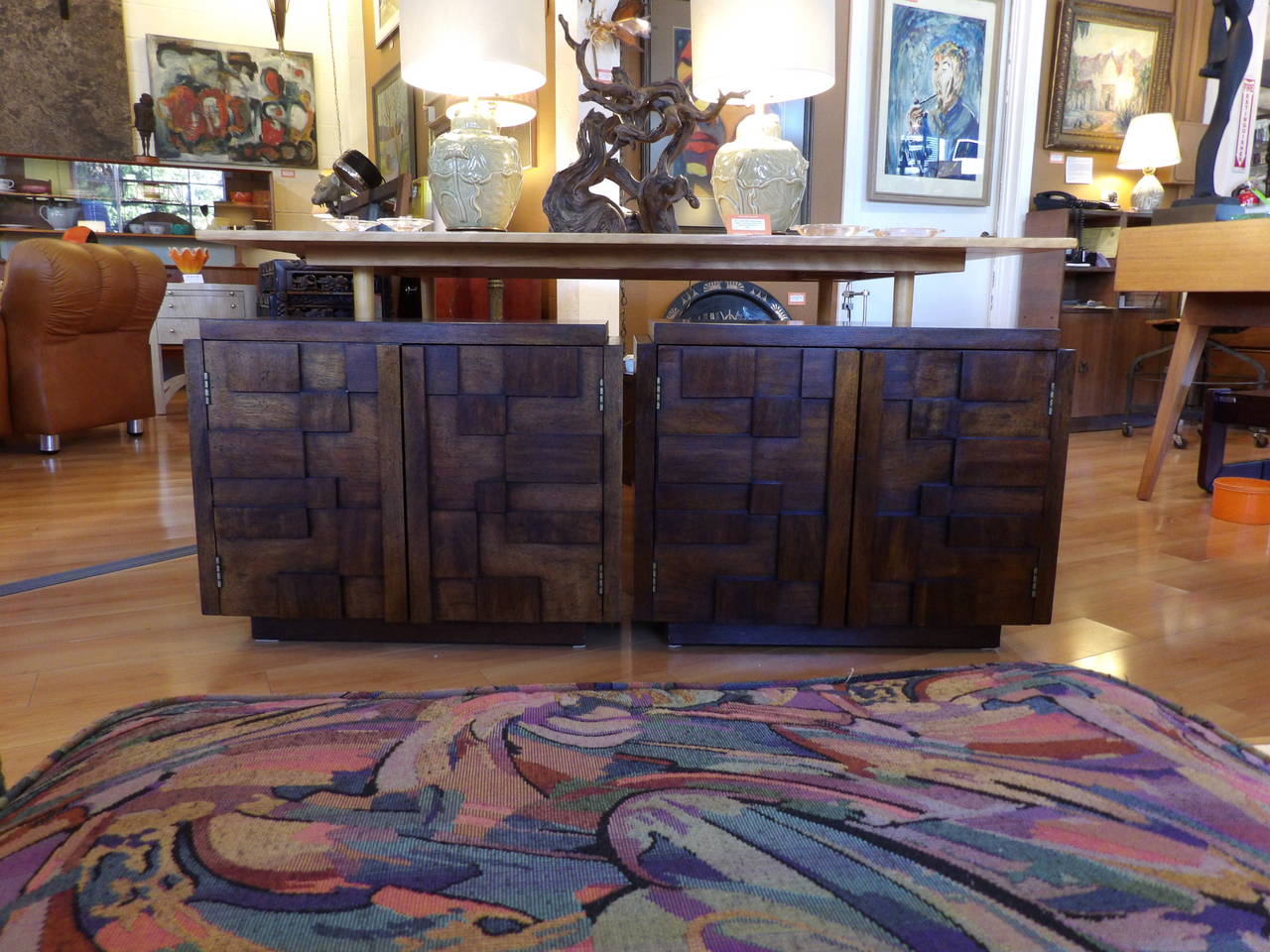 A pair of cubist style walnut end tables by Lane Furniture. Featuring double-doors with one interior shelf. Beautiful figured wood grain. 