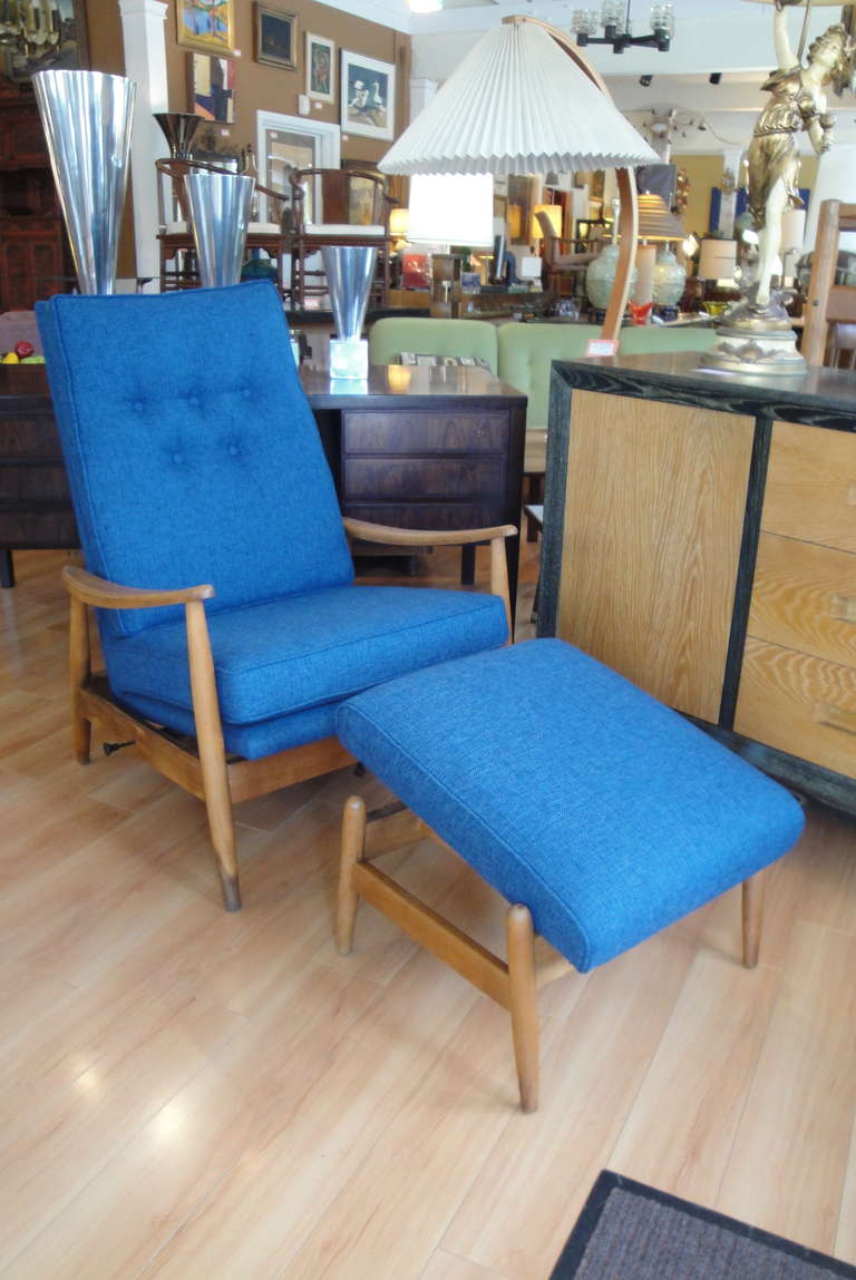 A signed Milo Baughman reclining lounge chair with matching, adjustable ottoman. New upholstery.