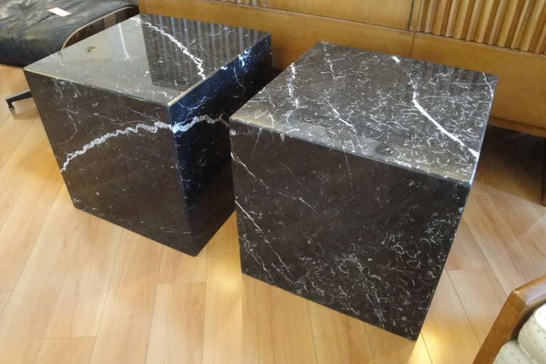 Fine marble cubical tables with extraordinary marble veining and book-matched patterns. Crafted from 3/4
