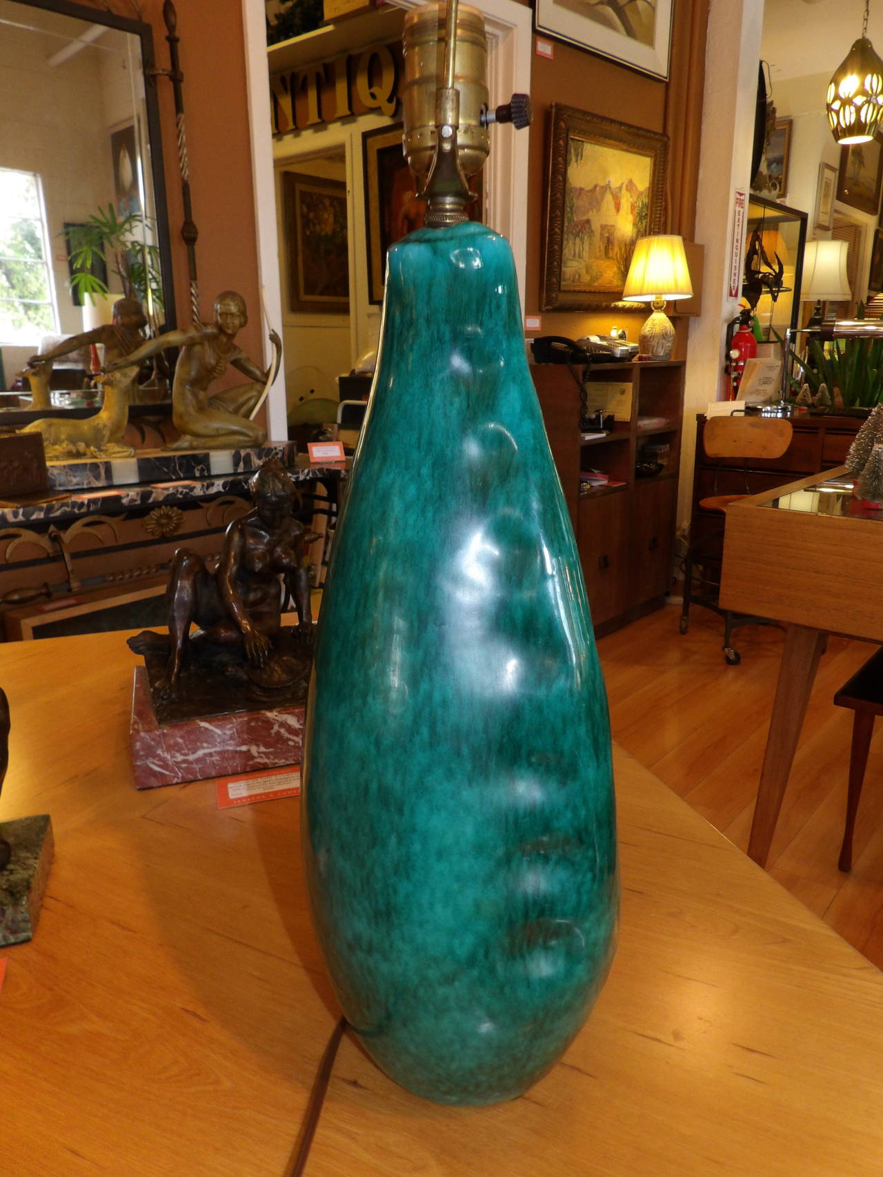 A signed Marcello Fantoni ceramic table lamp with a mottled blue/green glaze. Vintage, handmade shade (missing some threads) optional for cost of shipping. Height to finial measures 30