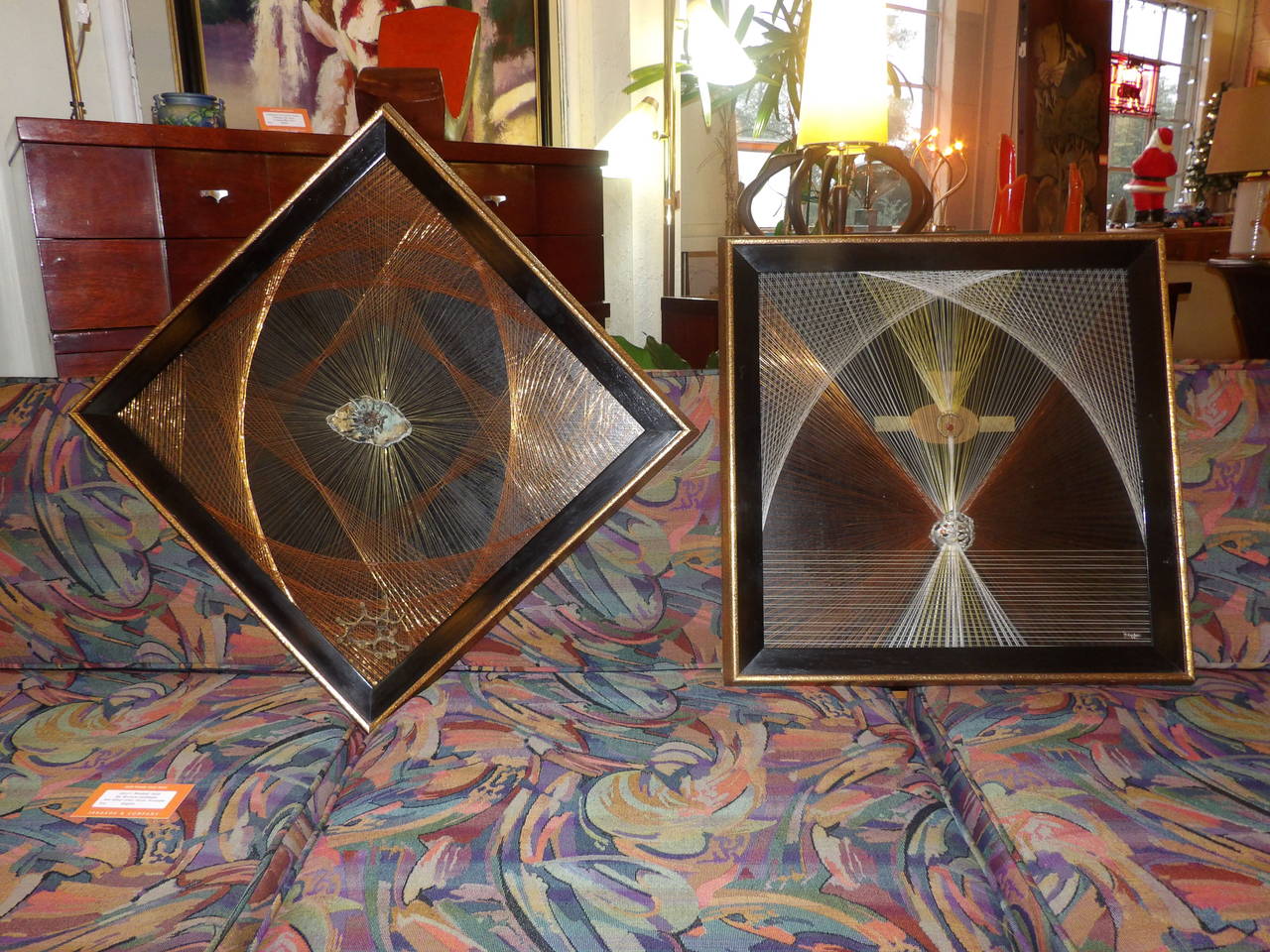 A great example of optical art from the 1960s. Consisting of copper wire, fishing line and fine string with applied abstract bronze and copper objects. Original frames. Artist signed and dated 1964. Light reflection at various angles is amazing.