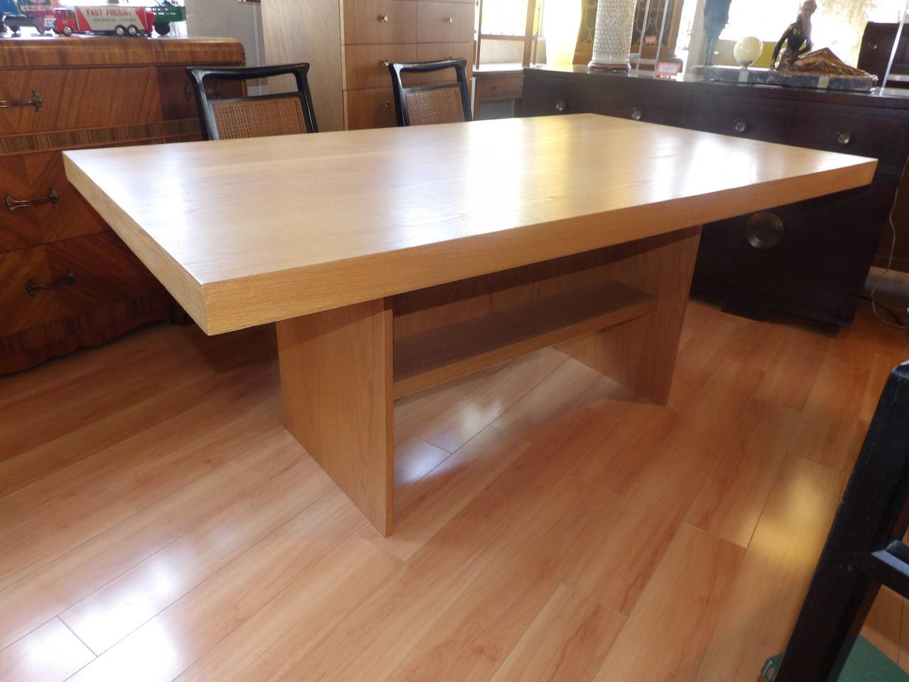 John H. Howe Design, Frank Lloyd Wright inspired golden oak dining table / desk. Originally from the estate of John H. Howe and his home, 