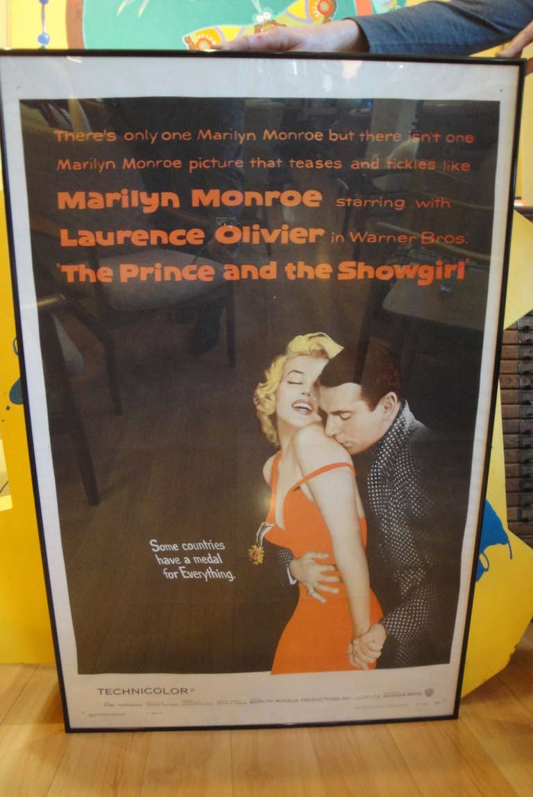 Original one sheet movie poster featuring Marilyn Monroe and Laurence Olivier in Warner Brother's 