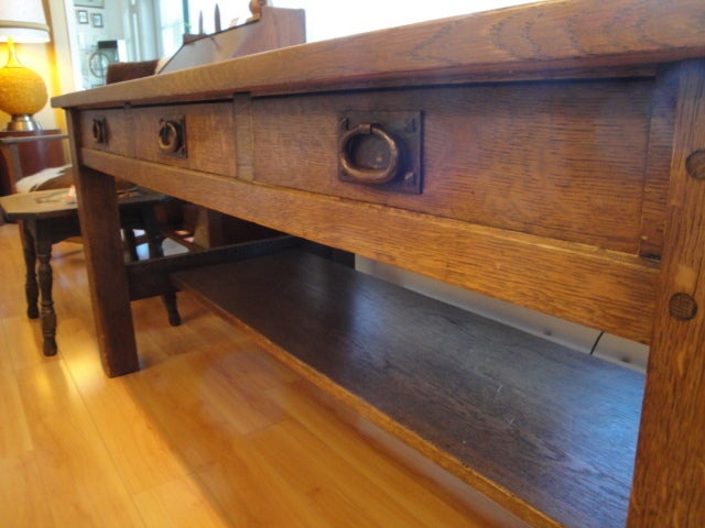 Fine Arts & crafts library table by Gustav Stickley. Signed with Eastwood paper label.