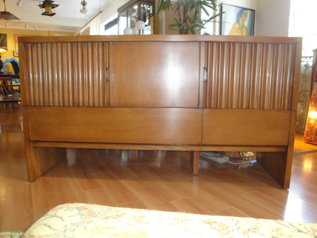 Fine Romweber credenza with fitted interior. Striking design with Art Deco and Industrial influences.