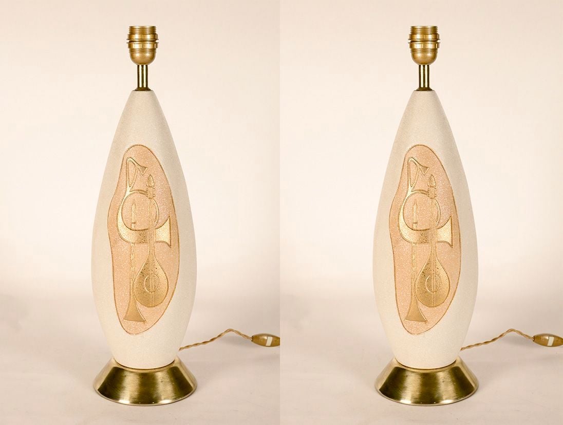 Pair of 1950s lamps with music instruments.