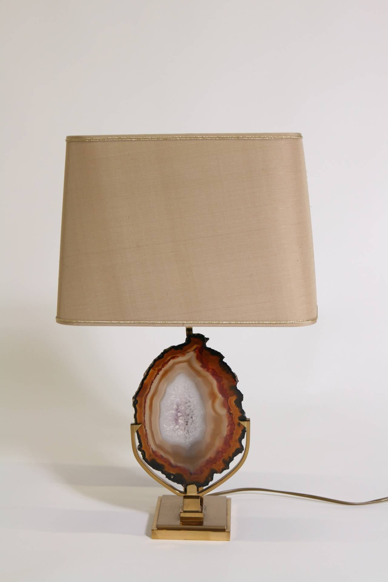 Brass table lamp with a slice of agate.