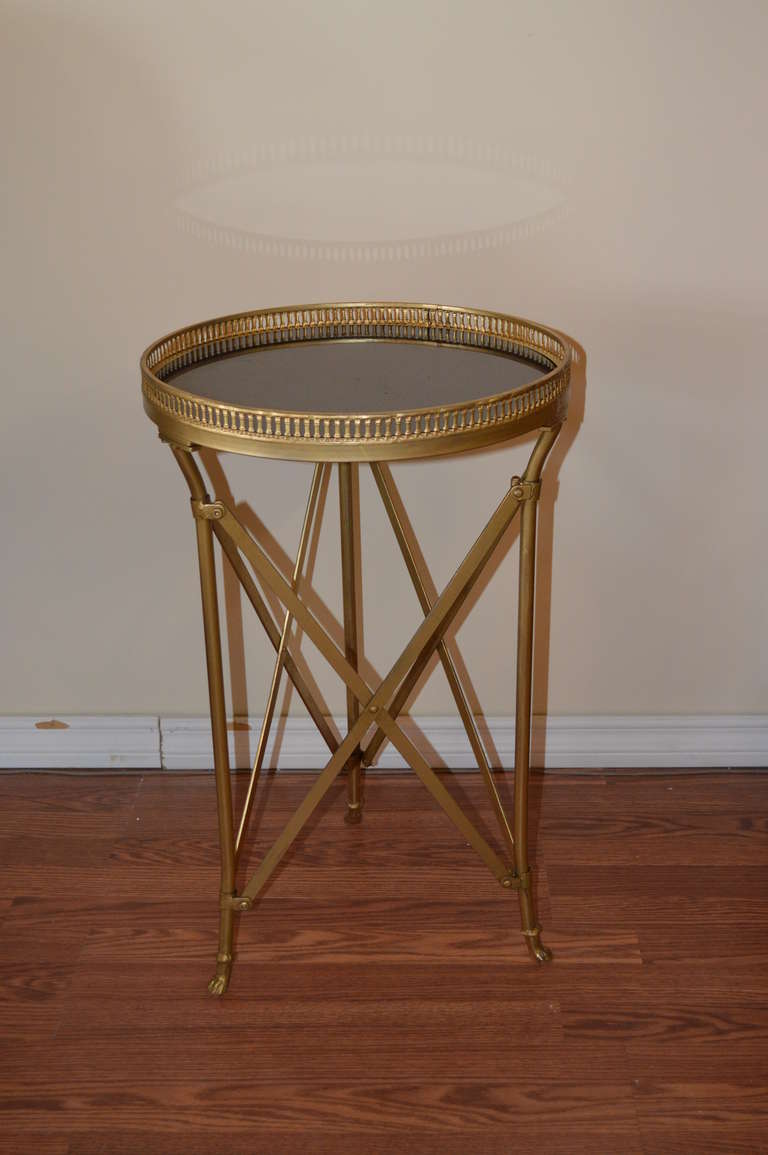 Pair of Industrial style iron gilded bouillotte tables.
