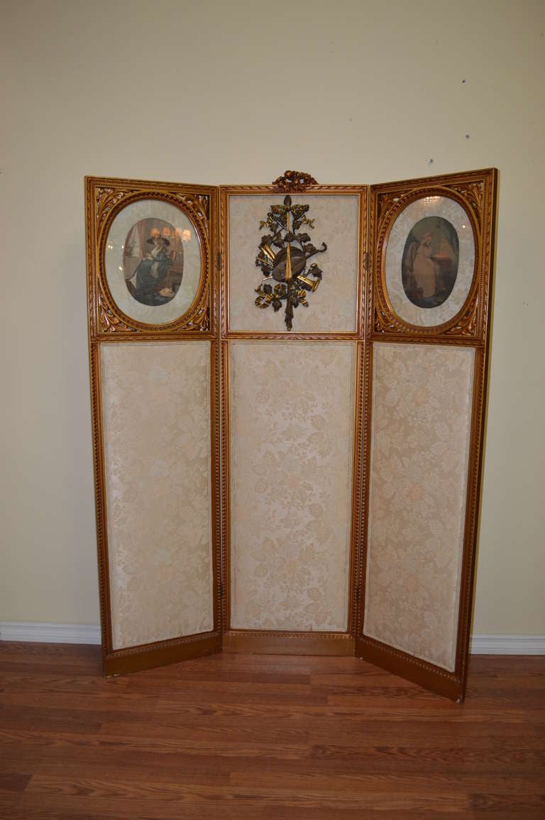 Louis XVI style gilded three panels screen.
