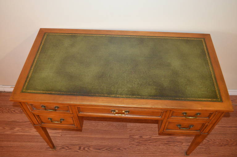 French Louis XVI Style Fruitwood Desk with leather top and side drawers. For Sale