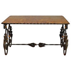Belle Epoque wrought iron coffee table with marble top.