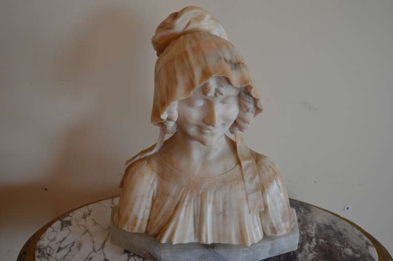 Beautiful Italian marble bust of a young lady with fine details., signed.
The aged marble has a lovely patina.