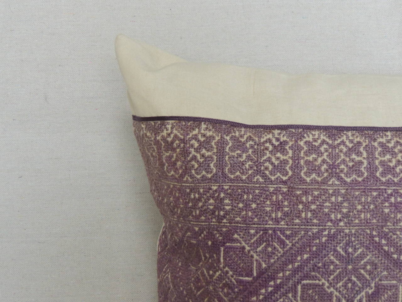 Antique textile Fez embroidery pillow, in shades of light purple and silk decorative trim as accents. Natural antique linen front and backing.