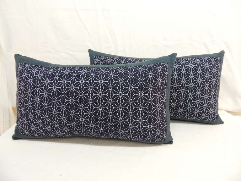 Traditional vintage Japanese printed textile indigo lumbar pillows framed and backed with vintage blue linen.