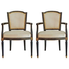 Pair of Ebonized and Guild Upholstered Arm Chairs