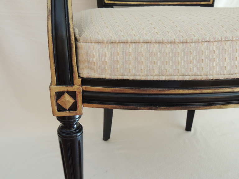 European Pair of Ebonized and Guild Upholstered Arm Chairs