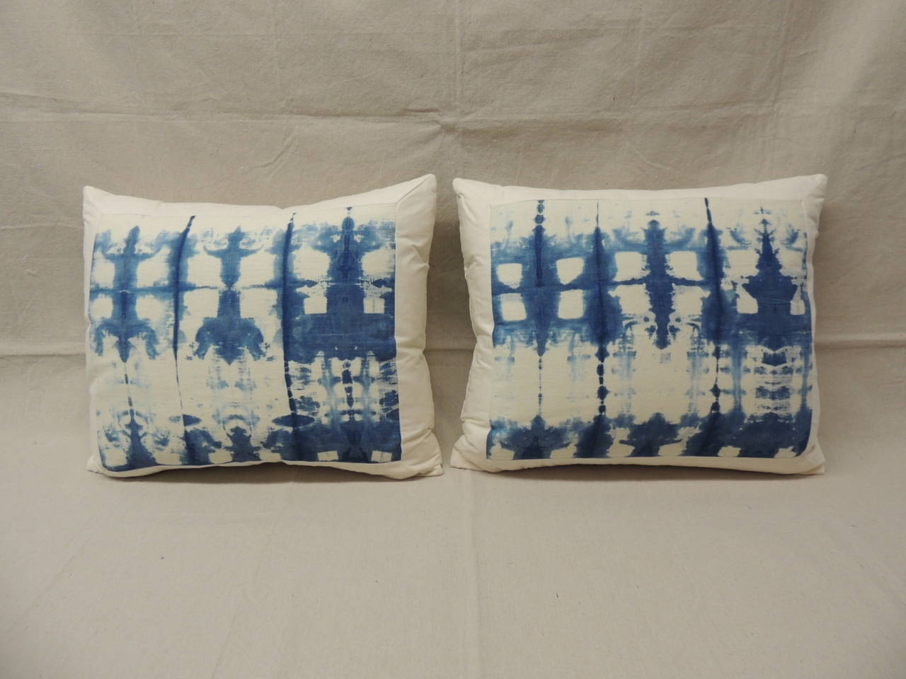 Pair of Japanese Shibori resist dyed blue and white linen pillows. White linen backing.
Decorative pillow handcrafted and designed in the USA. Closure by stitch (no zipper closure) with a custom-made pillow insert.