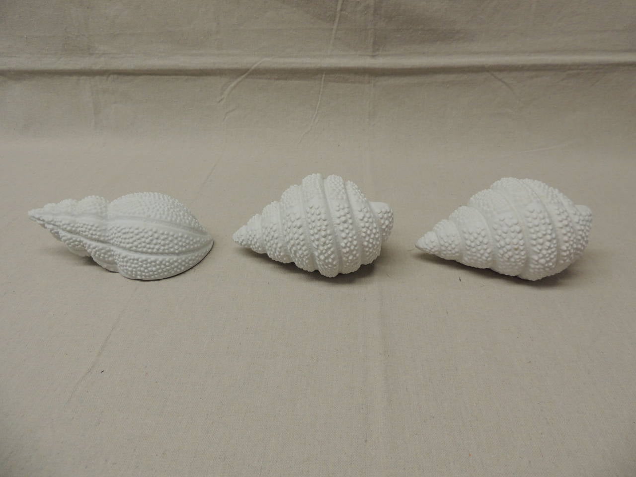 Mid-Century Modern Set of Three Bisque Porcelain Sea Snail Shells
