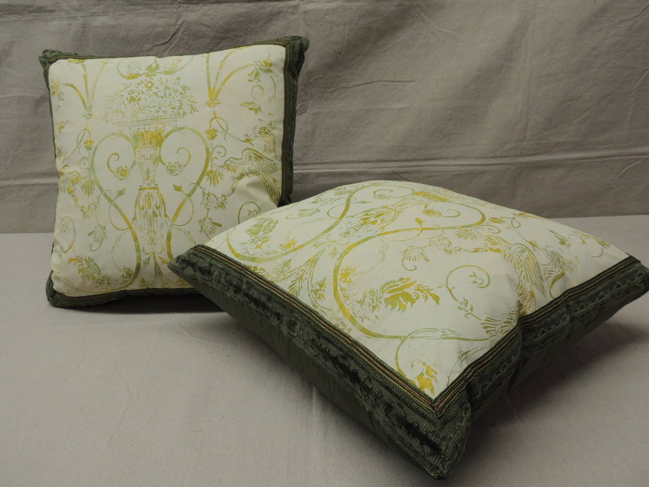 Antique Textiles Galleries...
Pair of green silk screen Fortuny style vintage textile pillows.  Throw pillows with antique green chenille trim and vintage silk green and gold metallic trim details. Green silk backings.  Decorative pillows