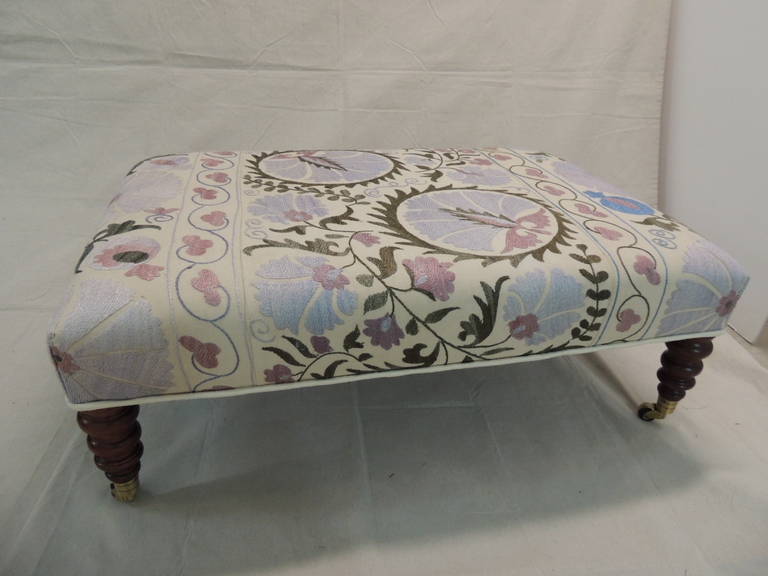 Suzani Upholster Ottoman with Casters.
