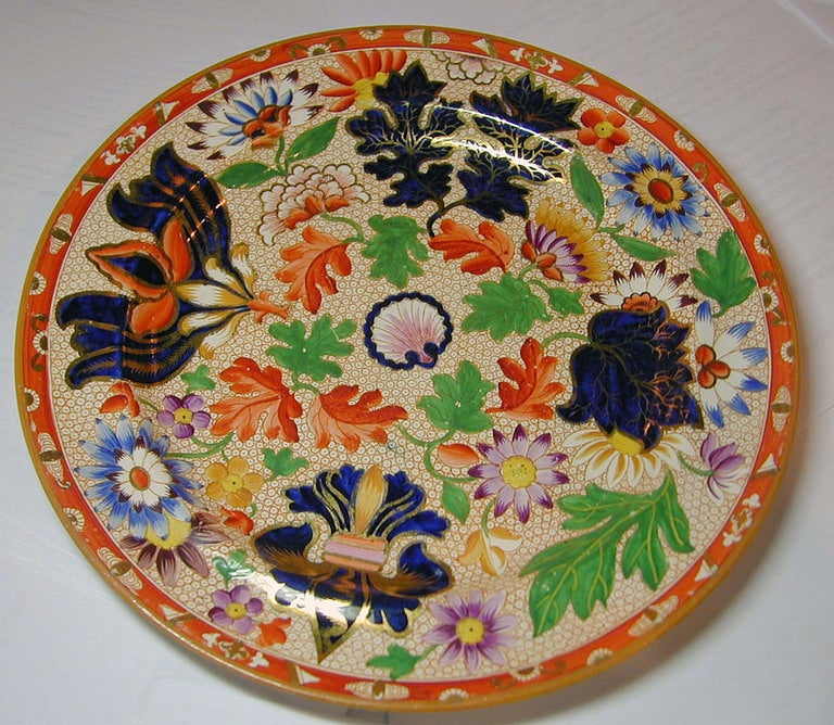 This magnificent Spode Chrysanthemum pattern soup plate would be wonderful displayed with its partner on a sideboard or mantel. Spode was influenced by a similar pattern designed by Wedgwood. He greatly enhanced the original by adding more colors
