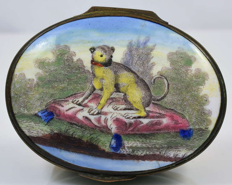Unusual Bilston enamel box in the shape of a pug with a painting of a pug on the lid. These boxes were made of painted enamel over copper and were developed to supply the demand of the growing middle class for decorative objects. The boxes were used