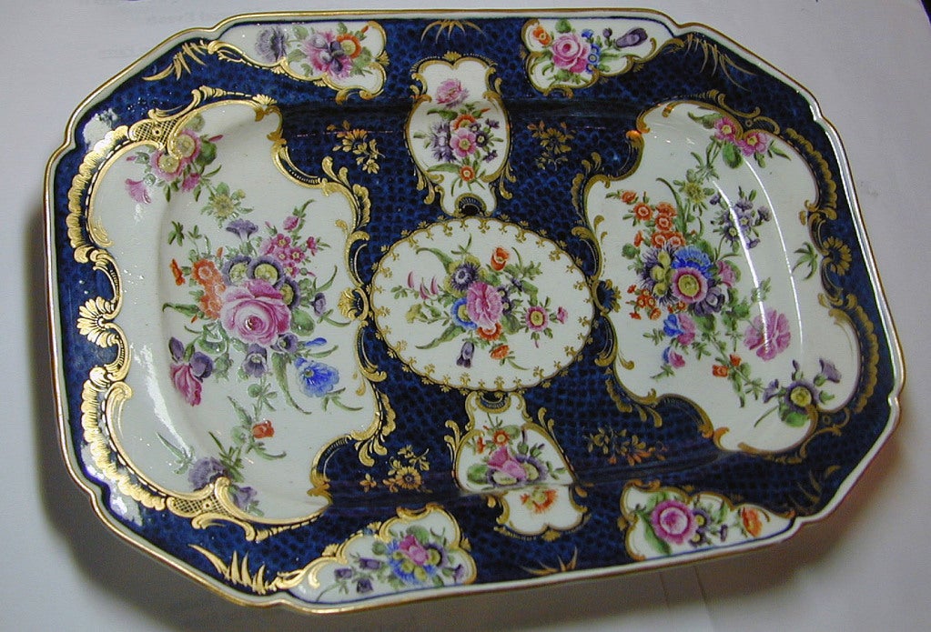 Dr. Wall Worcester hand painted floral platter with blue scale background and intricate gilding. The hallmark dates the platter to 1770.