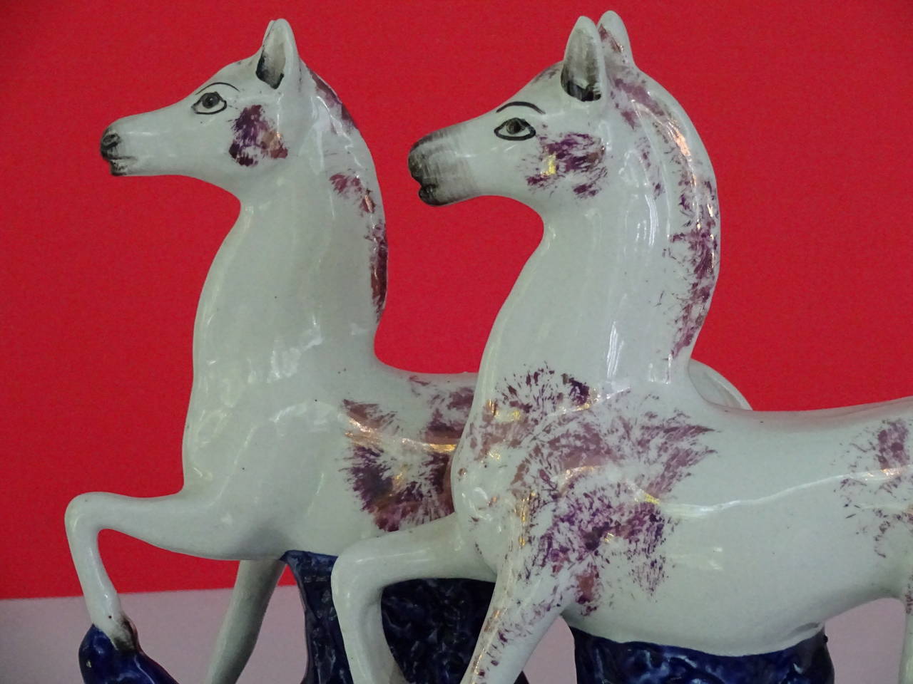 Porcelain Pair of Staffordshire prancing horses
