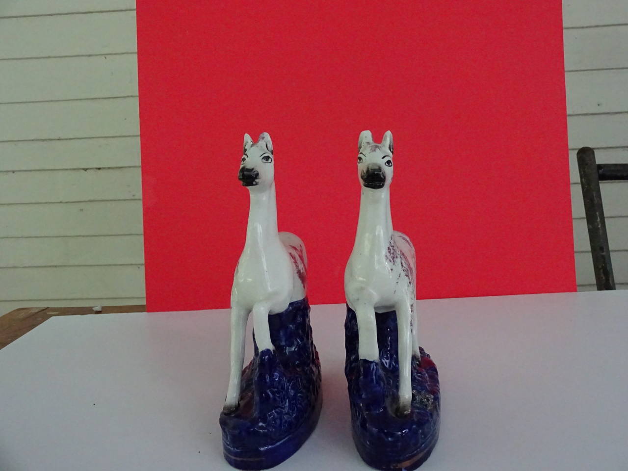 Pair of Staffordshire prancing horses 1