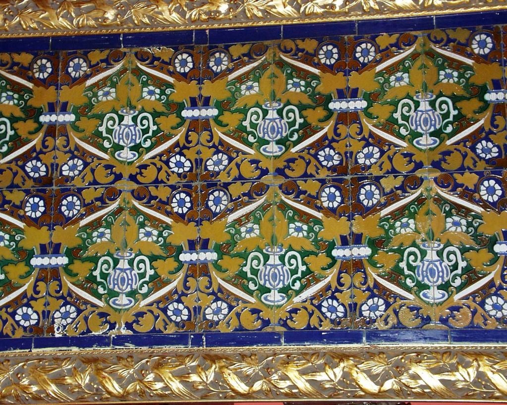 This collection of twenty four glazed ceramic tiles has the brilliant colors and design-work of Spanish/Moorish examples. The ceramic glazing of tiles has been an on-going process for hundreds of years, and in all likelihood, the Islamic countries