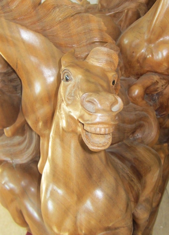 A Wooden Diorama Of Horses Carved From Singular Piece Of Wood