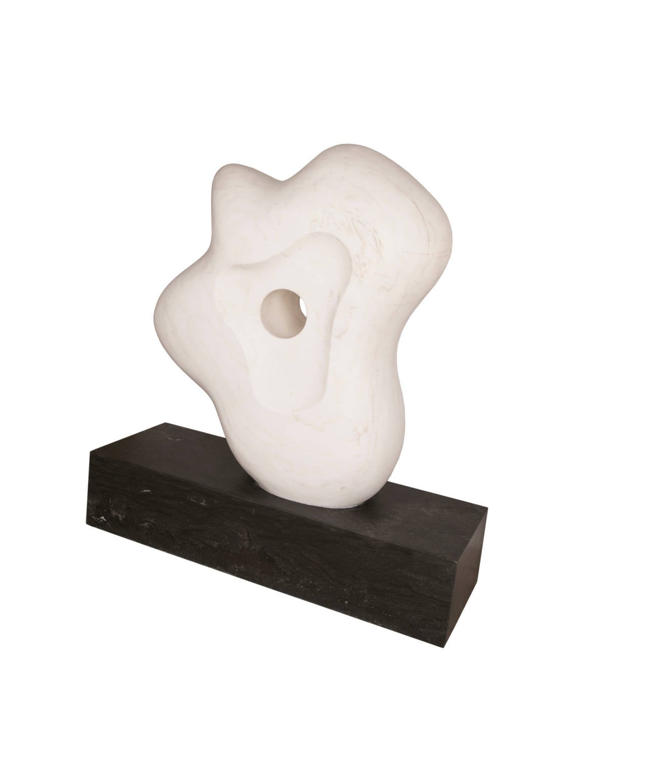 This artisanal sculpture is an exotic piece of modern art and a vibrant home or outdoor accessory. Hand-carved from honed white calcutta and negro marquina marble, the sweeping lines of this monolithic piece add an elevated flourish to any space.