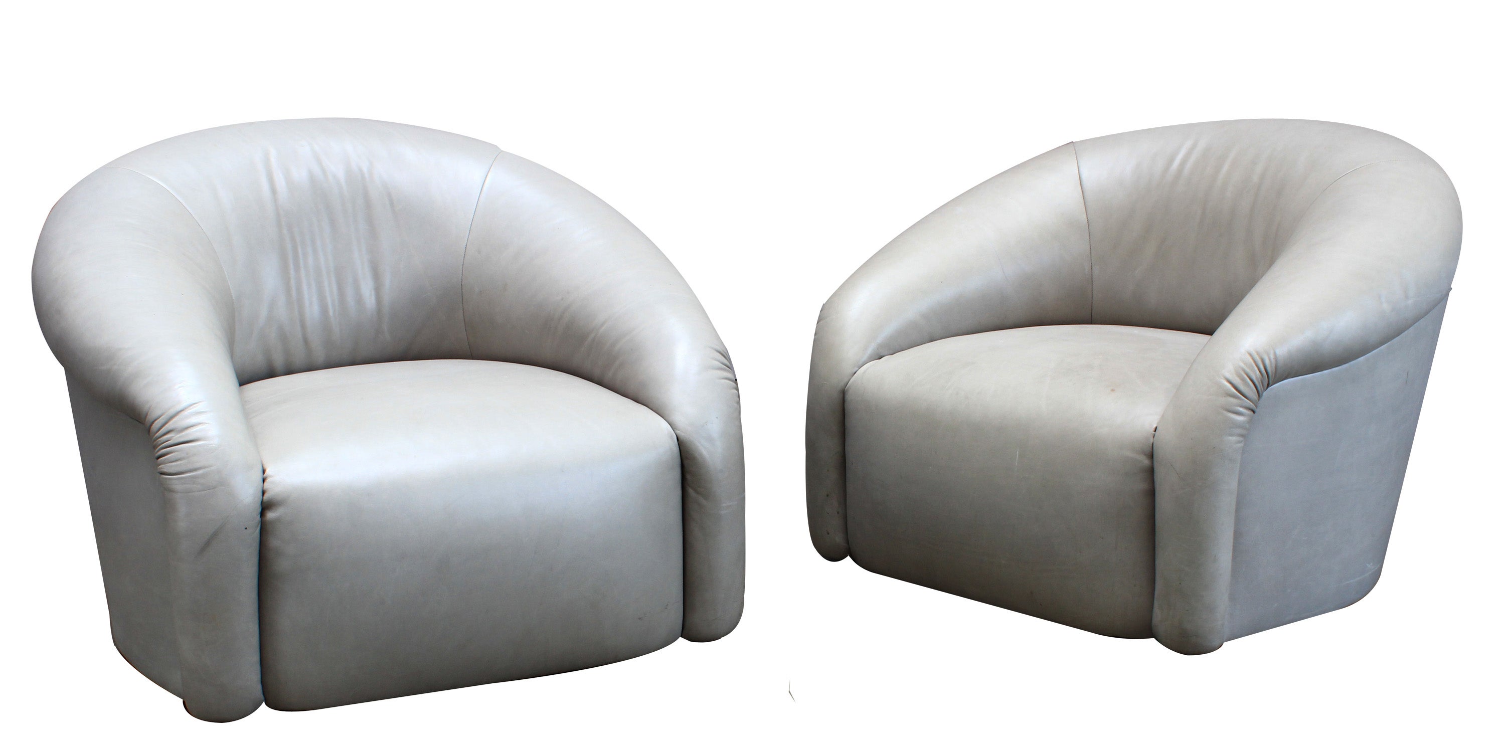 A Pair of 1970s Barrel Back Swivel Club Chairs