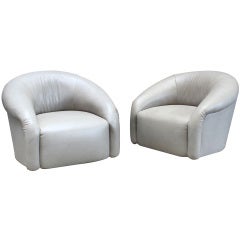 A Pair of 1970s Barrel Back Swivel Club Chairs