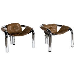 A Pair of 1970s Three Legged Chrome Sling Chairs