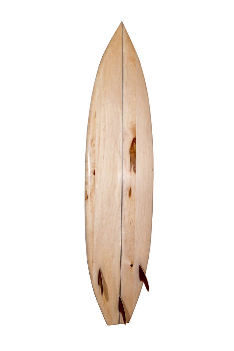 Mulholland Surfboard by Kelly Wearstler. Inspired by Kelly’s love of Malibu Surf Culture, this unique decorative surfboard bears the name of the famously winding California road, Mulholland Drive. The handcrafted puzzle design features a spectrum of