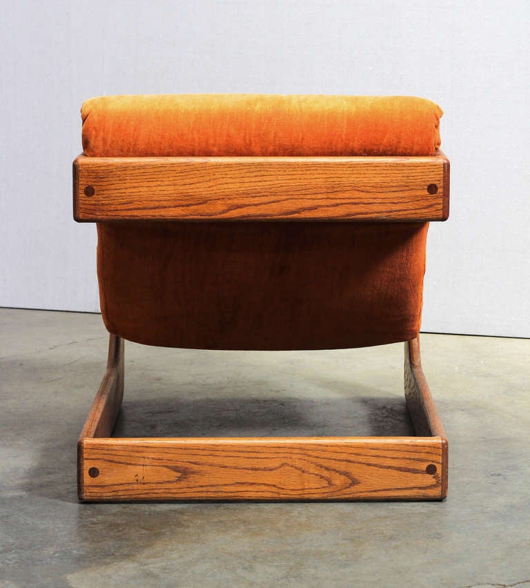 American A Pair of Walnut Lounge Chairs by Lou Hodges