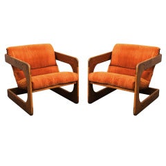  A Pair of Walnut Lounge Chairs by Lou Hodges