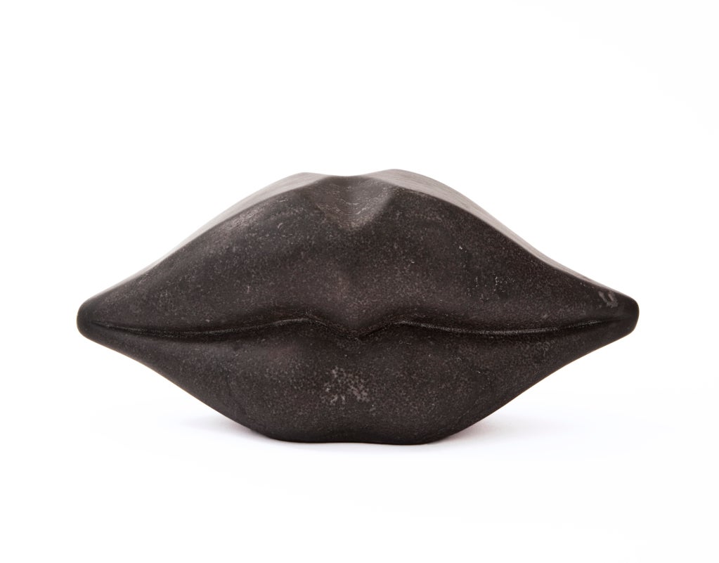 Big Double Kiss by Kelly Wearstler. This Big Kiss sculpture — available in either solid negro marquina or white carrara marble — is a
conversation-starting art piece perfect for a curated bookshelf, coffee table or mantle. Each piece is hand