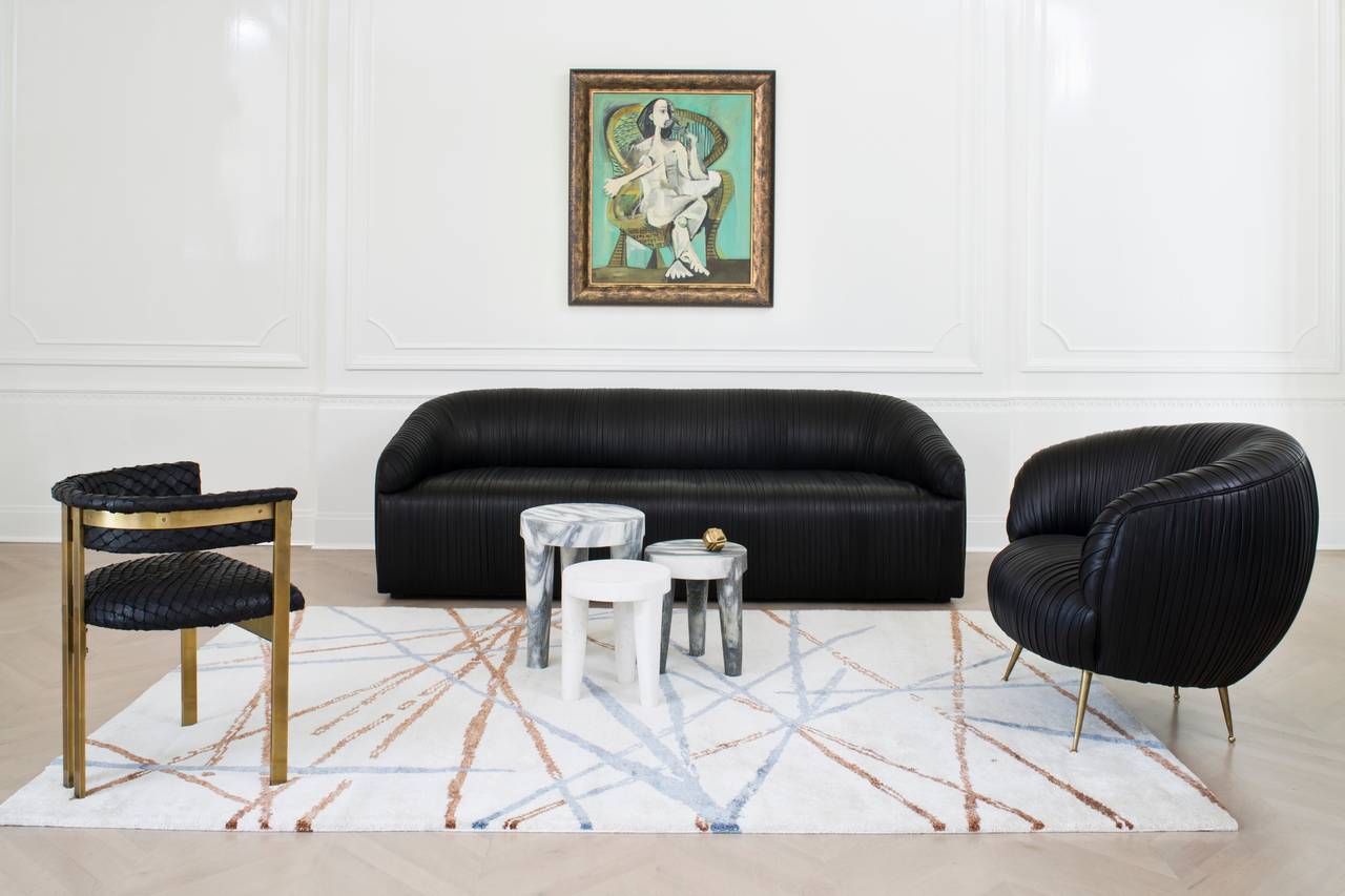 Carved out of a solid block of marble, this stool is a perfect example of a classic, modern shape that is effortlessly stylish. Great as either a stool or small table, the tribute stool is available in Negro Marquina, white calacatta, big flower or