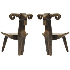 A Pair of Hand Carved Sculptural Ram Chairs