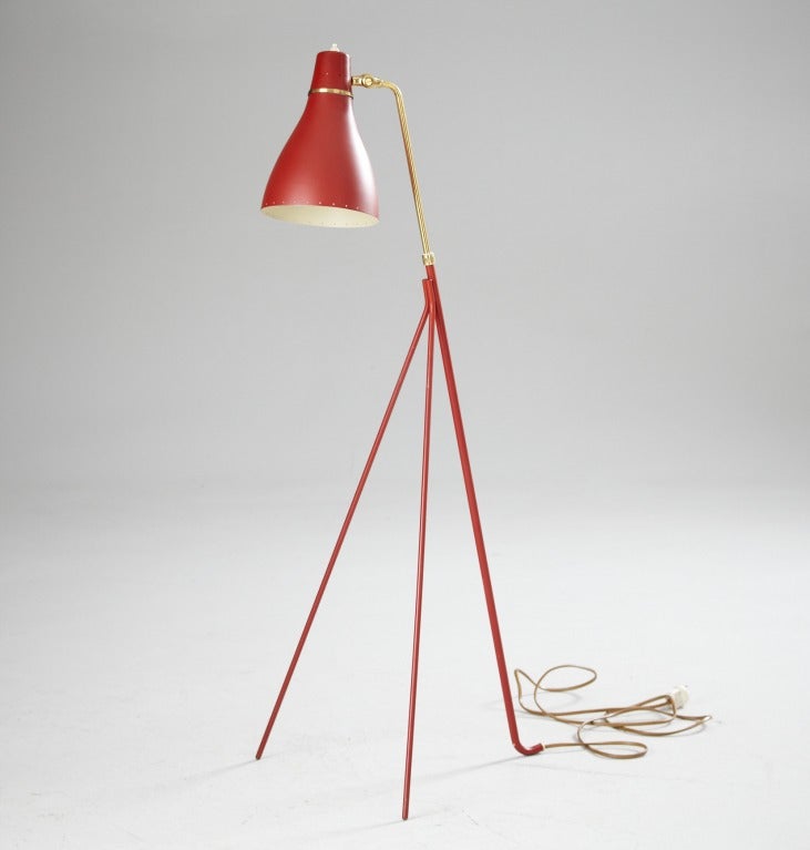 This is a rare early version of the Grasshopper lamp manufactured by Bergboms, same manufacturer as the later, 1947 Grasshopper lamp by Greta Magnusson Grossman. It is in near mint condition!!! In a beautiful red. 
Bares manufacturer's mark B.