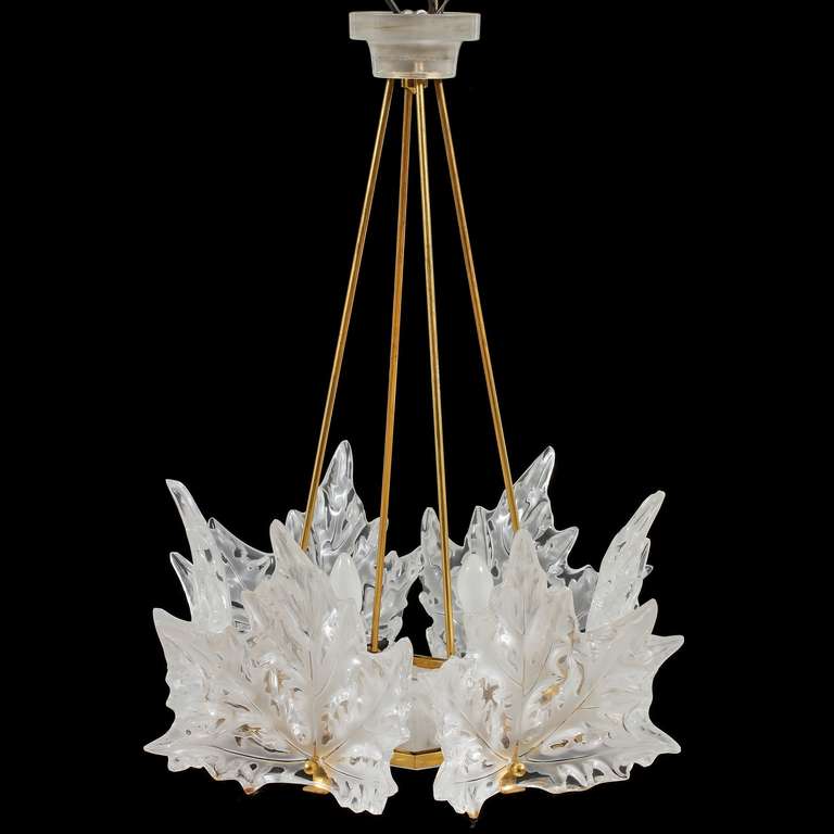 Elegant rare original vintage René Lalique Champs Elysees crystal chandelier.  Frosted glass leaf form decoration signed Lalique. 

Provenance: Hôtel Crillon, Paris.

This is a vintage example, it is no longer available from Lalique.

A
