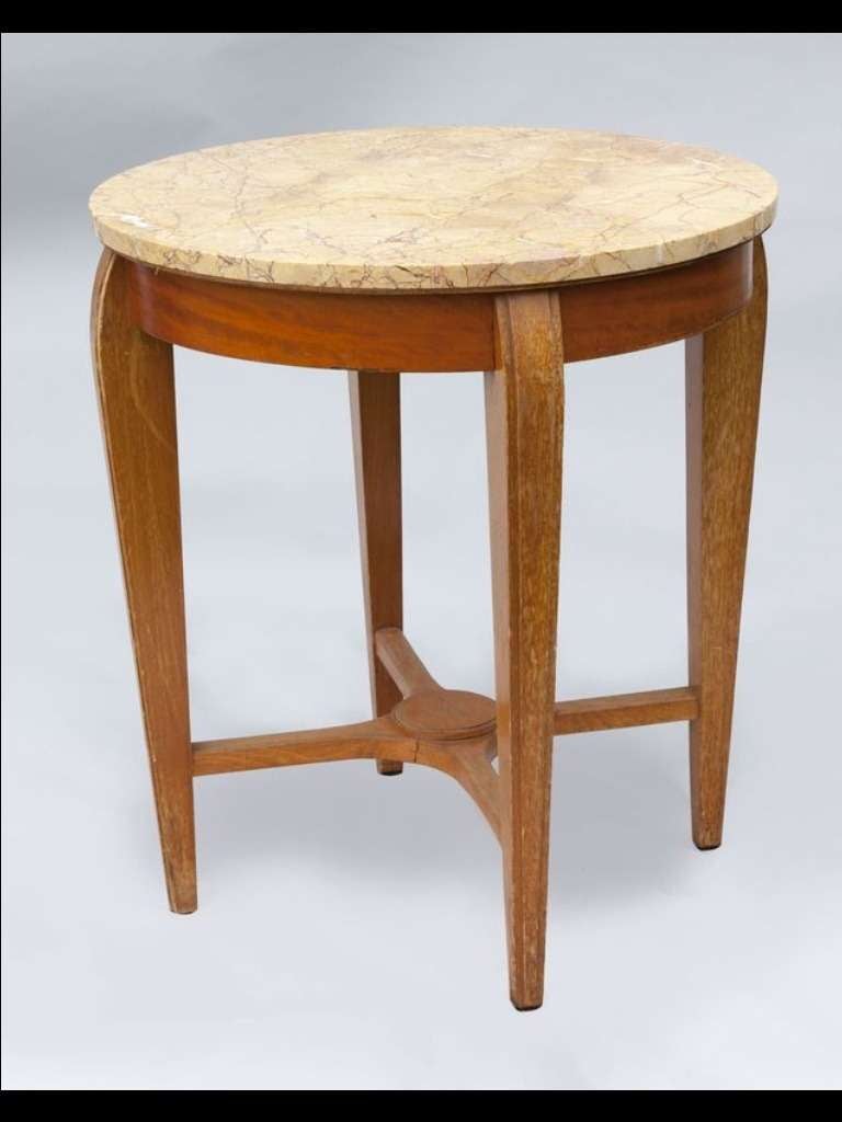 2 Pairs of French Art Deco Marble-Topped Gueridons /
Pedestal Tables in natural wood with four tapered legs joined by an indentation, with a marble top.

4 tables available, preferably sold as pairs, priced individually.