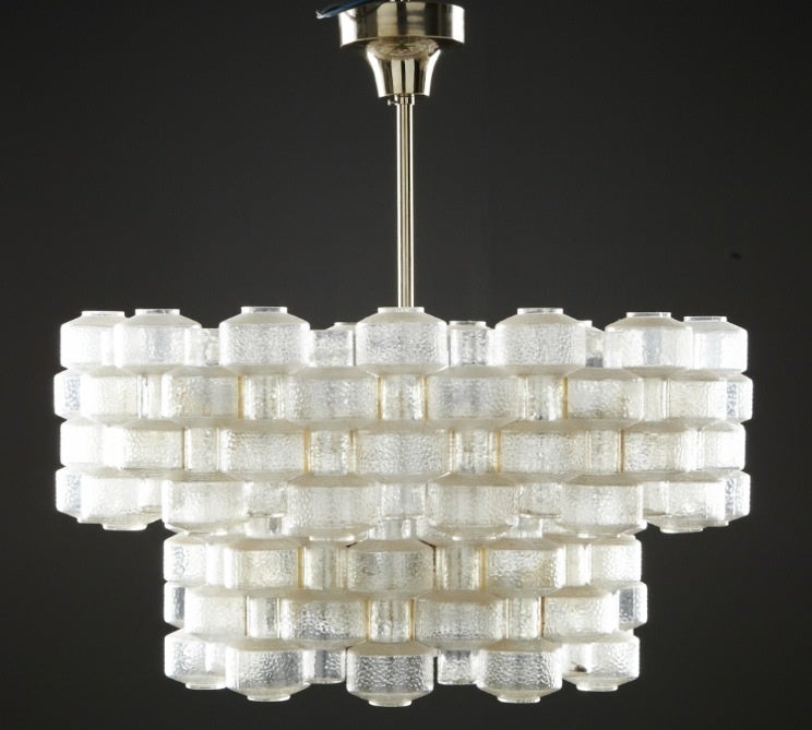 2 Beautiful Orrefors Glass Chandeliers by Carl Fagerlund.
Pressed glass pieces interlocking on metal frame.
Height of actual chandeliers is 20.1in, including the current metal rod the height measures 31.5in. 
The rod can obviously be shortened or