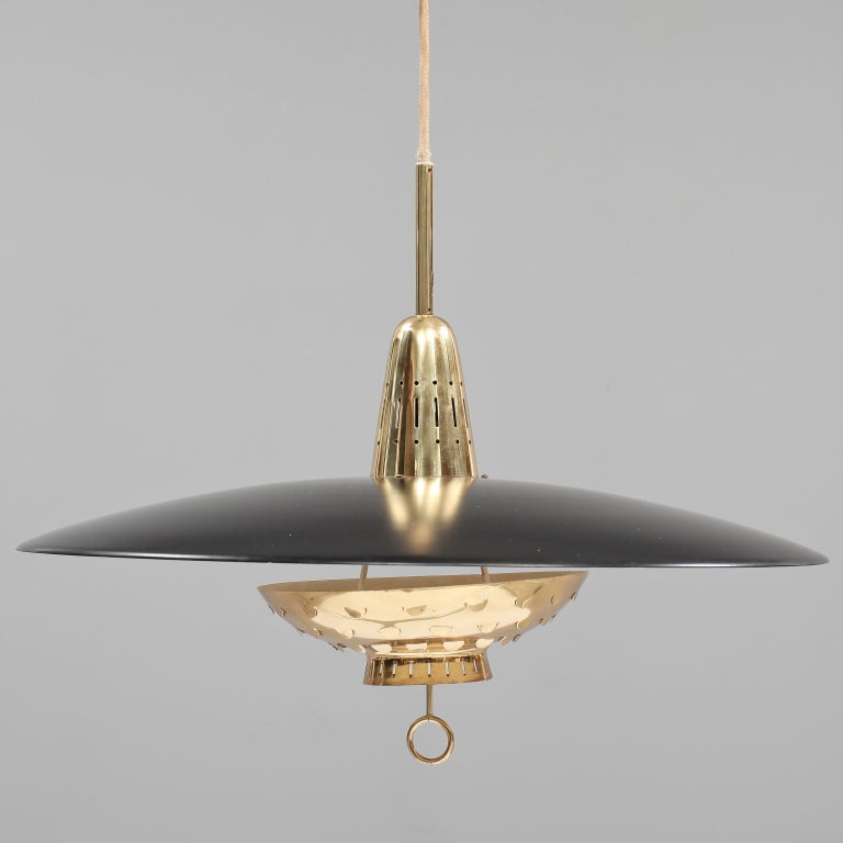 Stylish Height-Adjustable Light Fixture by Lisa Johansson-Pape