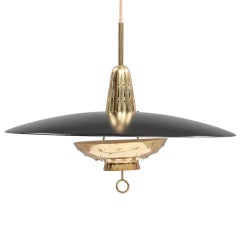 Stylish Height-Adjustable Light Fixture by Lisa Johansson-Pape