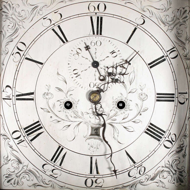 A fine late 18th century mahogany cased Grandfather clock with works by William Ballantyne of Edinburgh.

The clock has an eight day striking movement with two weights and strikes the hour. The brass and silver dial has engraved detail and